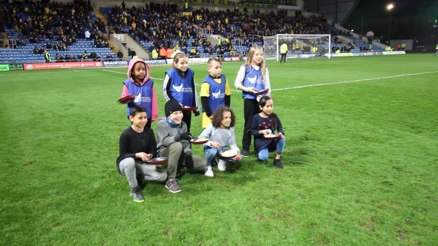 Pancake race on pitch at OUFC